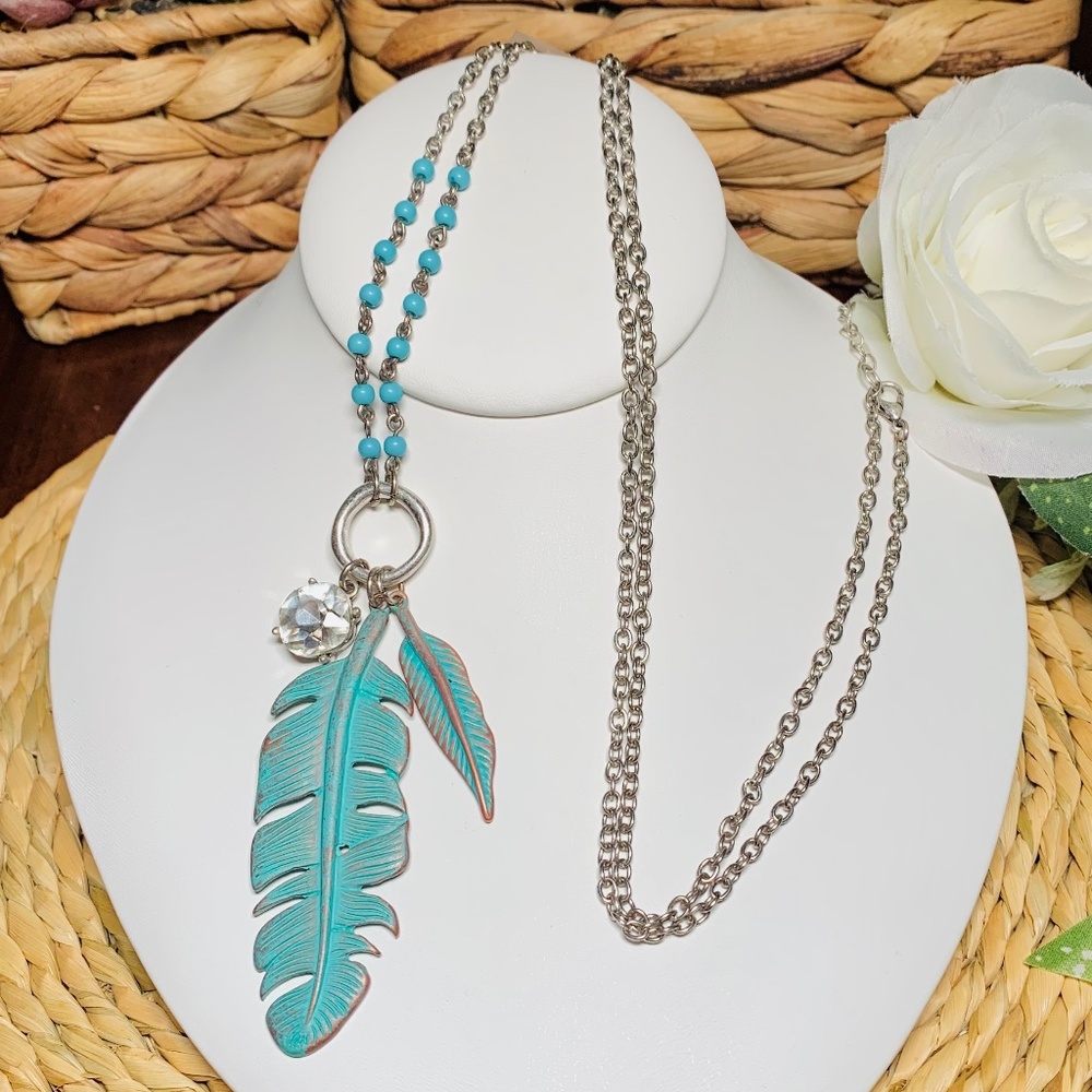 Metal Teal Feathers & Crystal Pendant adorn this Unique Beaded long Necklace